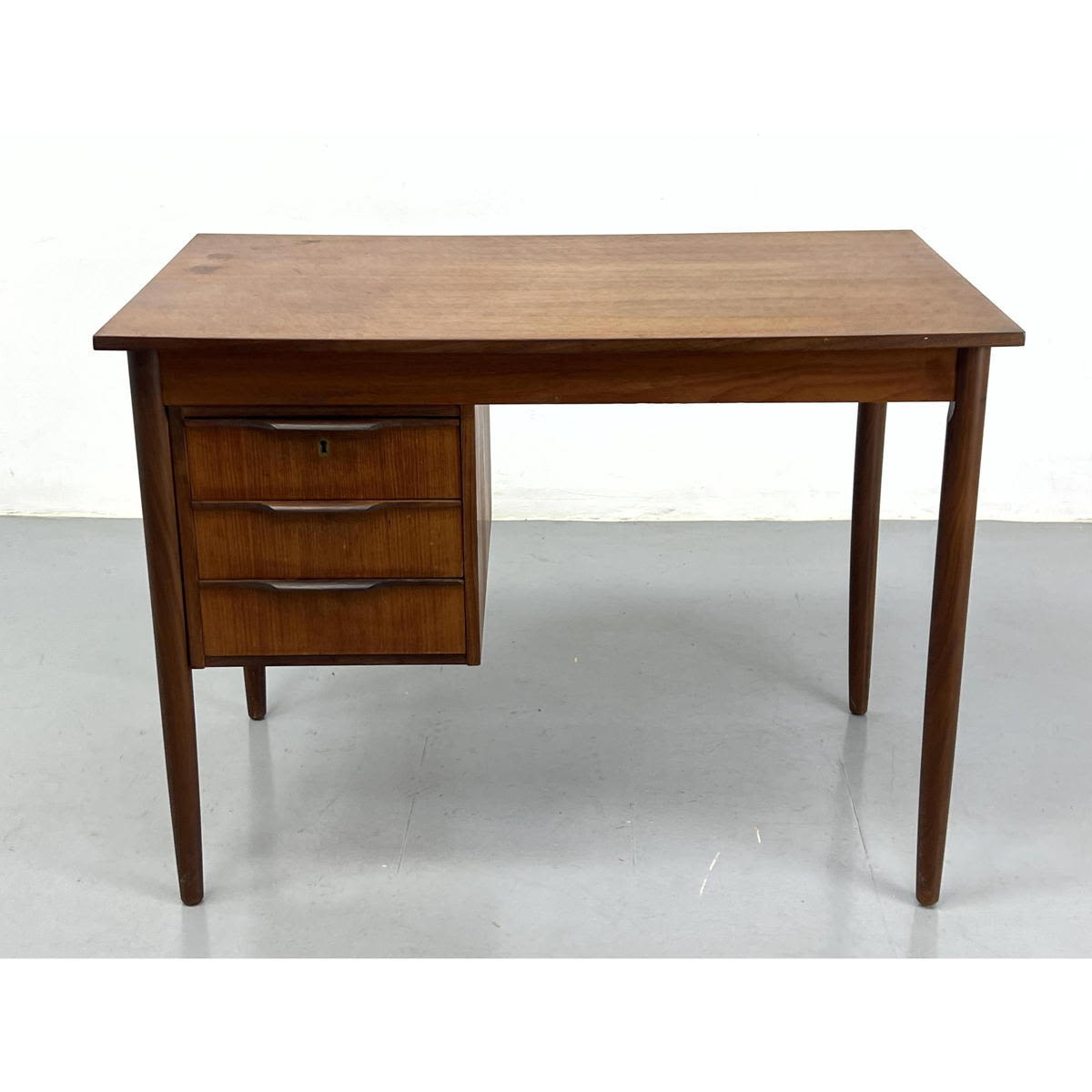 Danish Modern Three Drawer Desk. Tapered