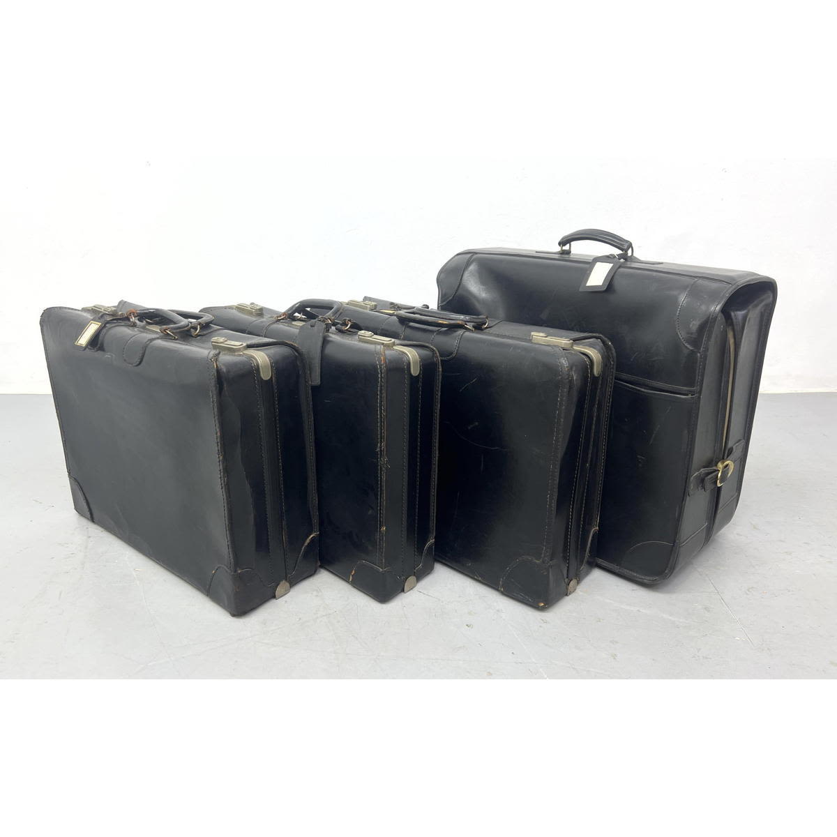 4pc Vintage Black Leather Suitcases