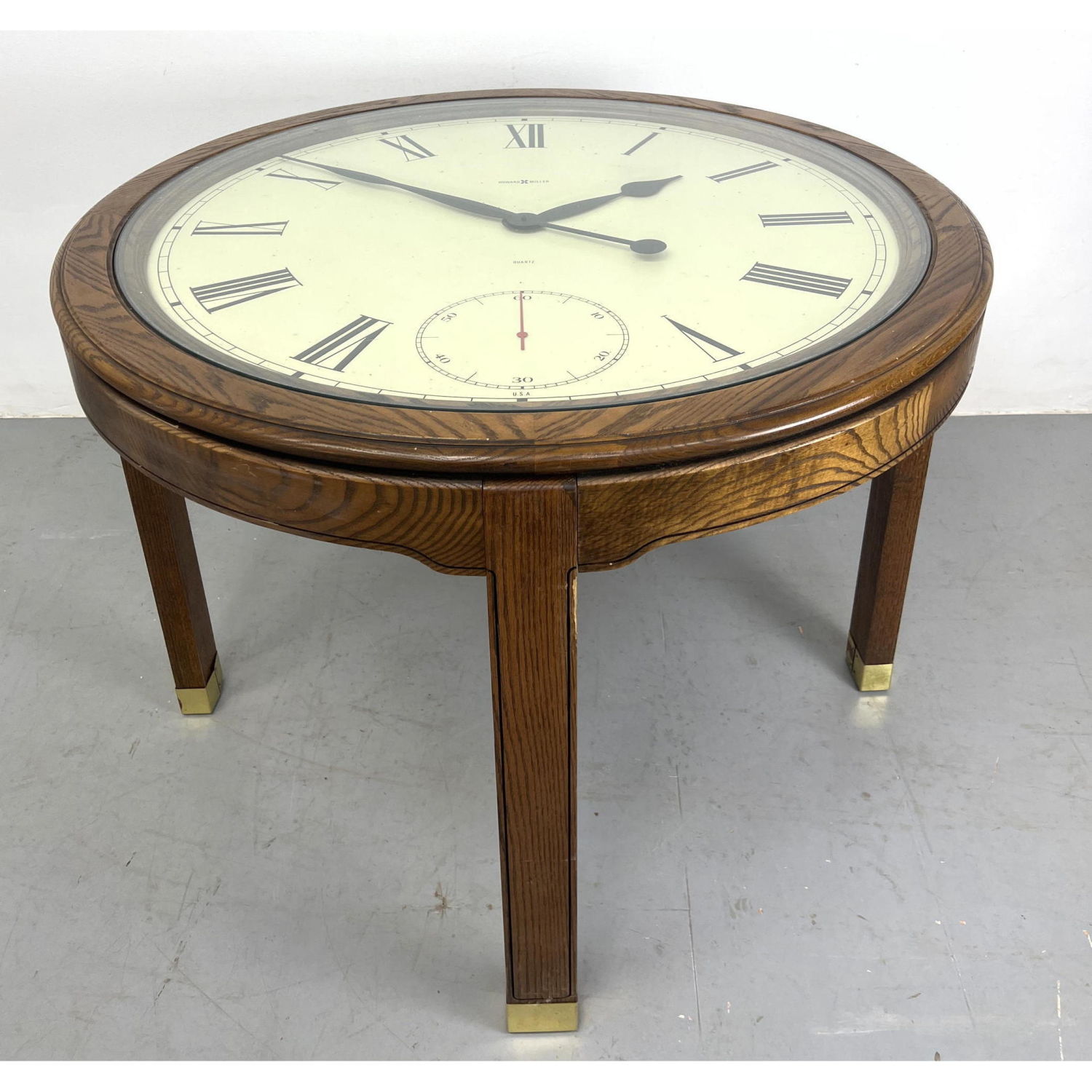 Howard Miller Clock Center Table. Oak