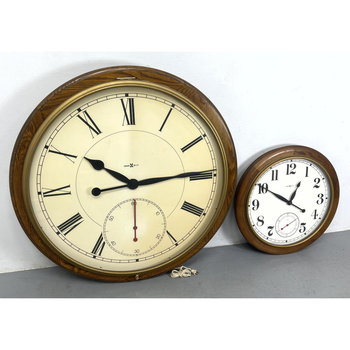 2pcs Howard Miller Wall Clocks  2ff8e6