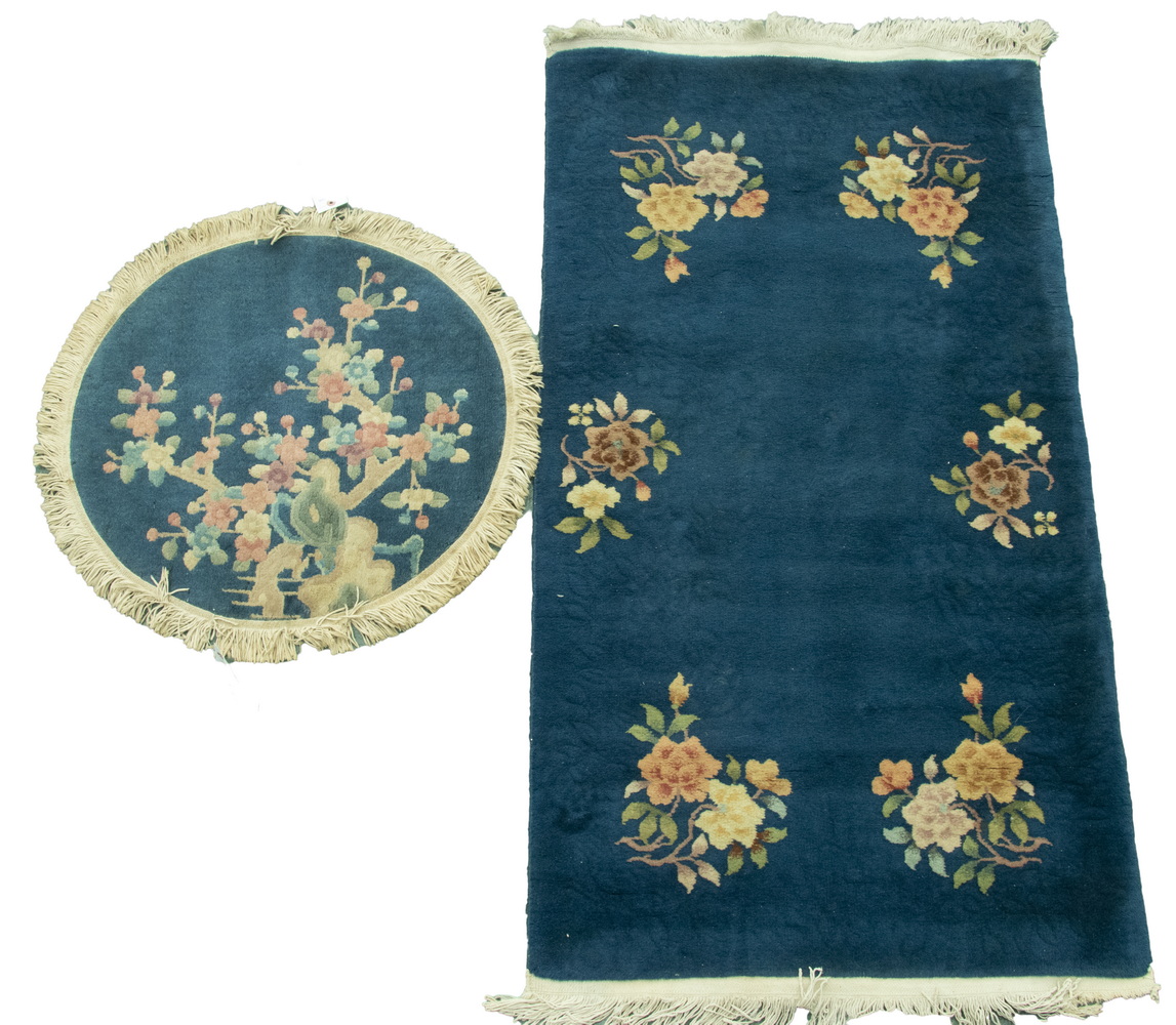  2 CHINESE RUGS One with an open 302079