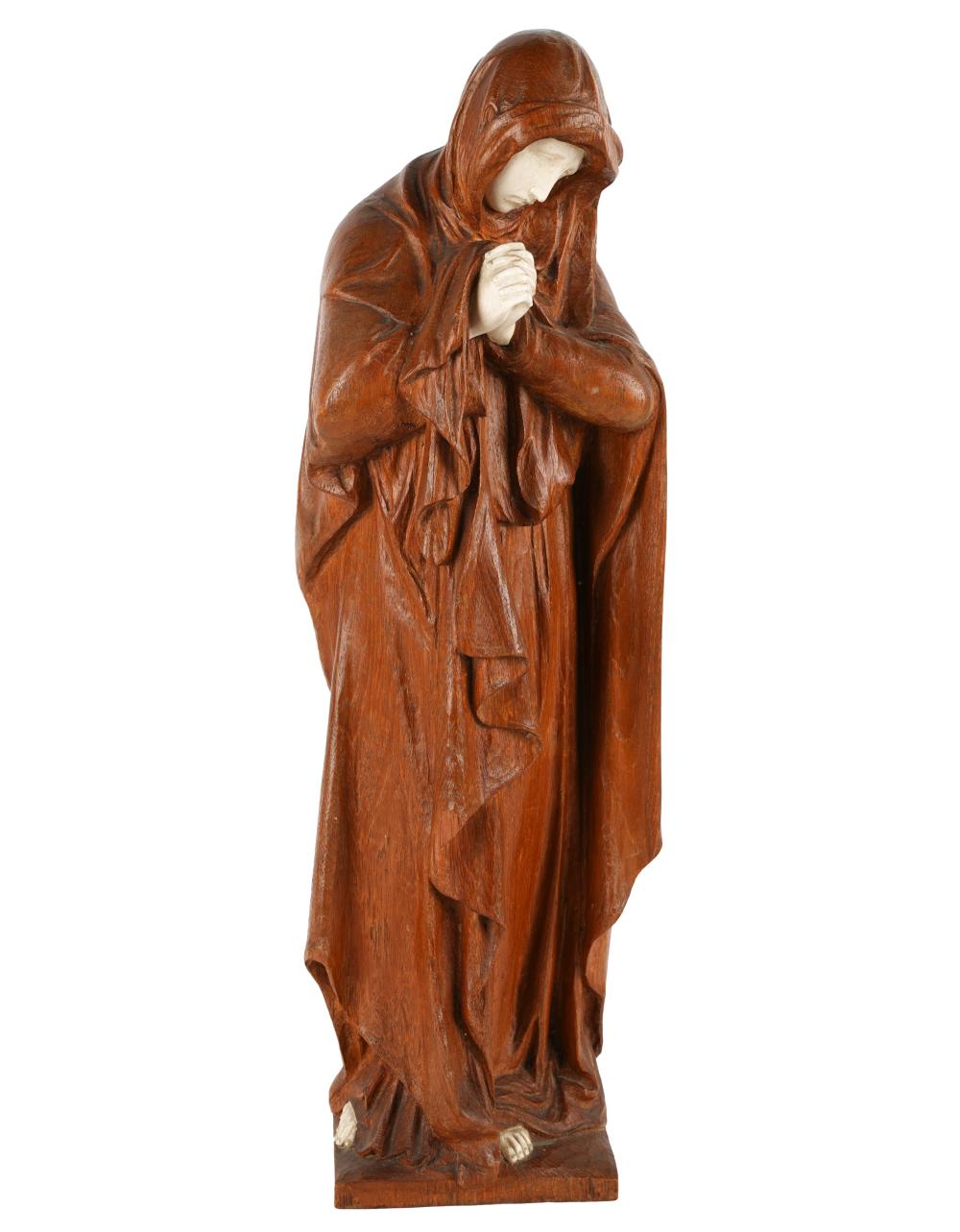 CARVED WOOD RELIGIOUS FIGUREwith bone