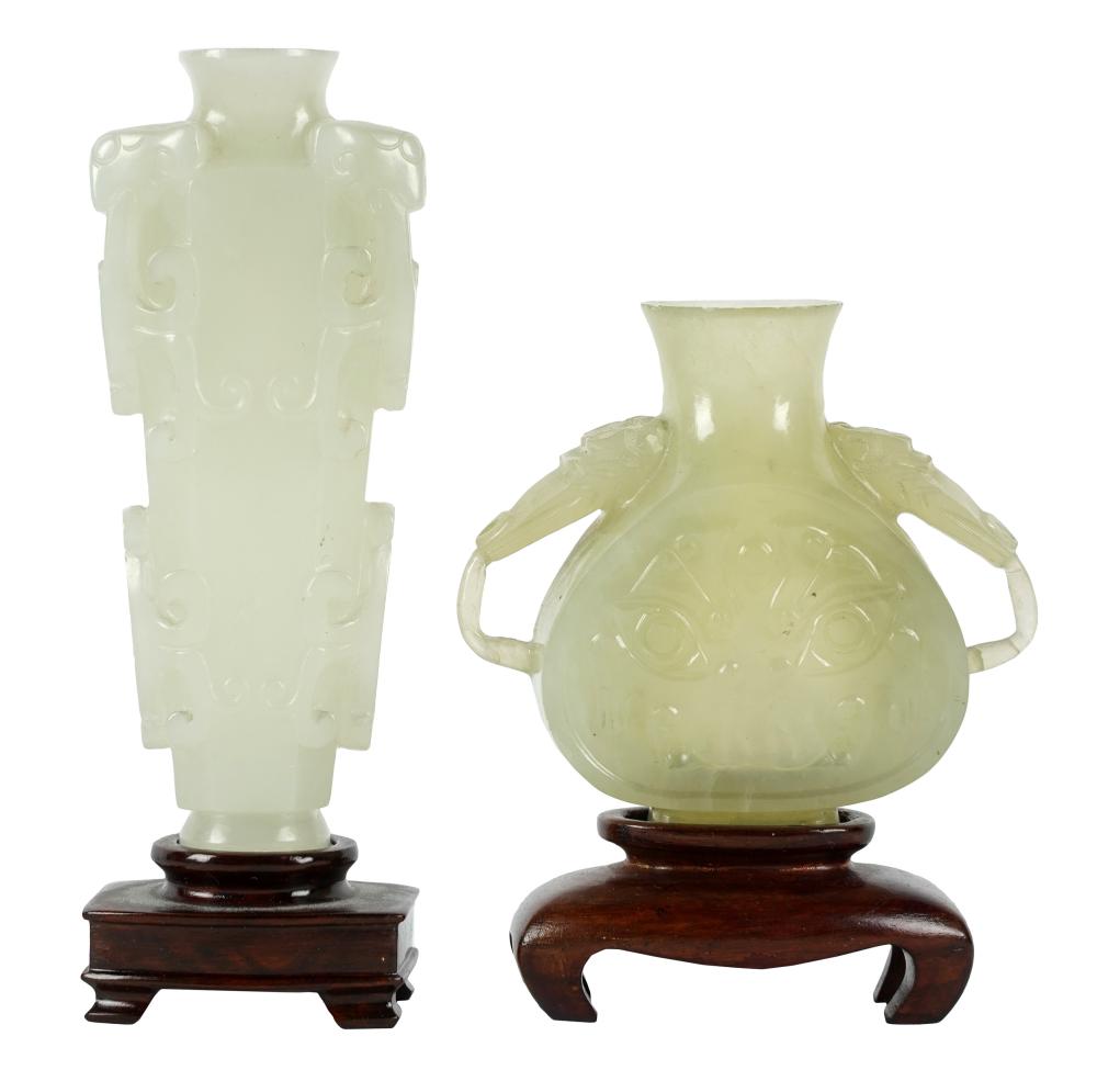 TWO CHINESE CARVED JADE SNUFF BOTTLESProvenance: