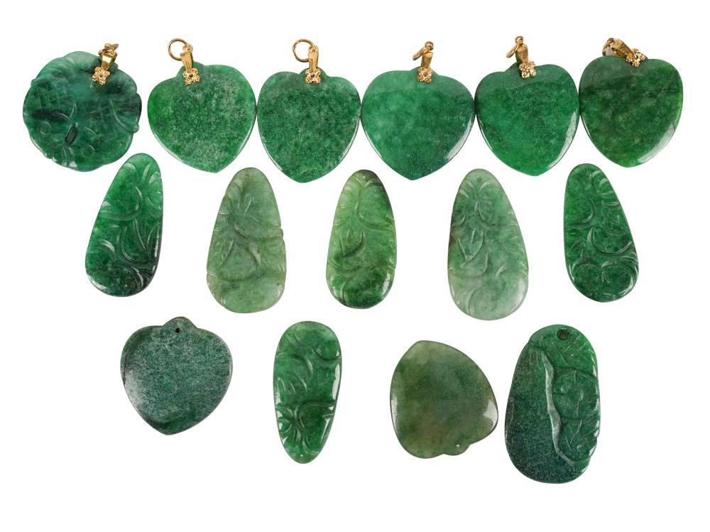 GROUP OF GREEN STONE PENDANTScomprising 301286