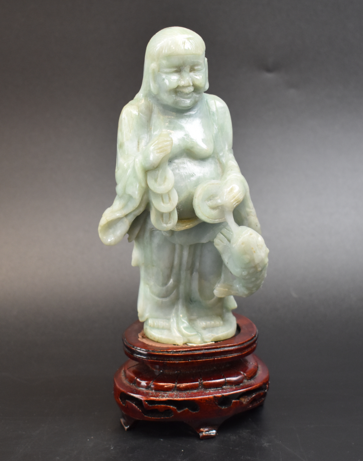 A CHINESE JADEITE CARVED LOUHAN