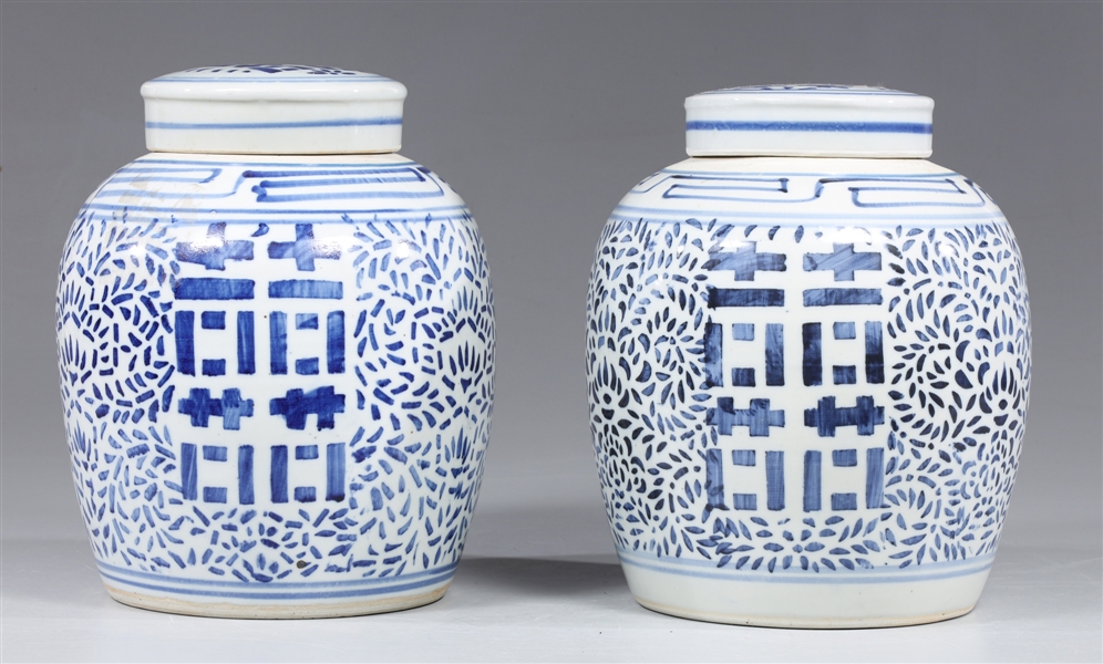Pair of Chinese blue on white covered