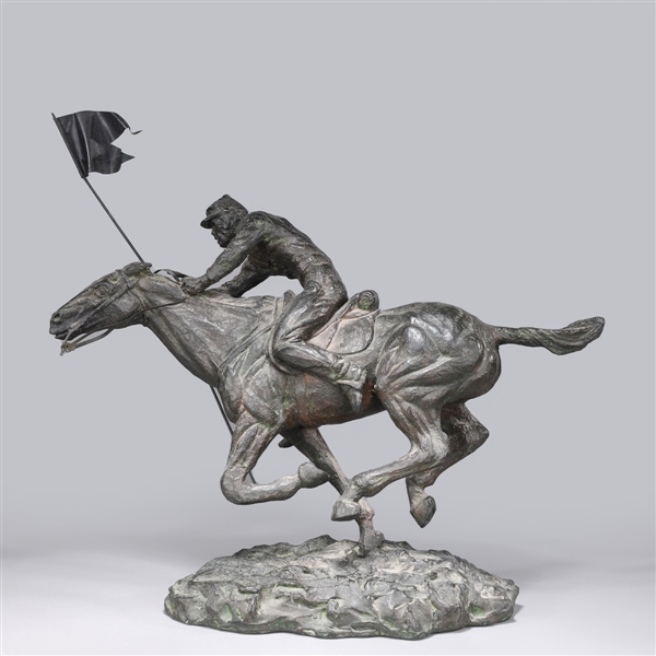 Metal model of horse and rider