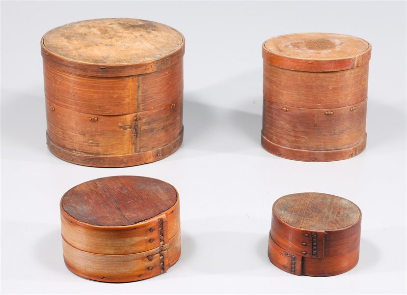 Group of four vintage round stacking
