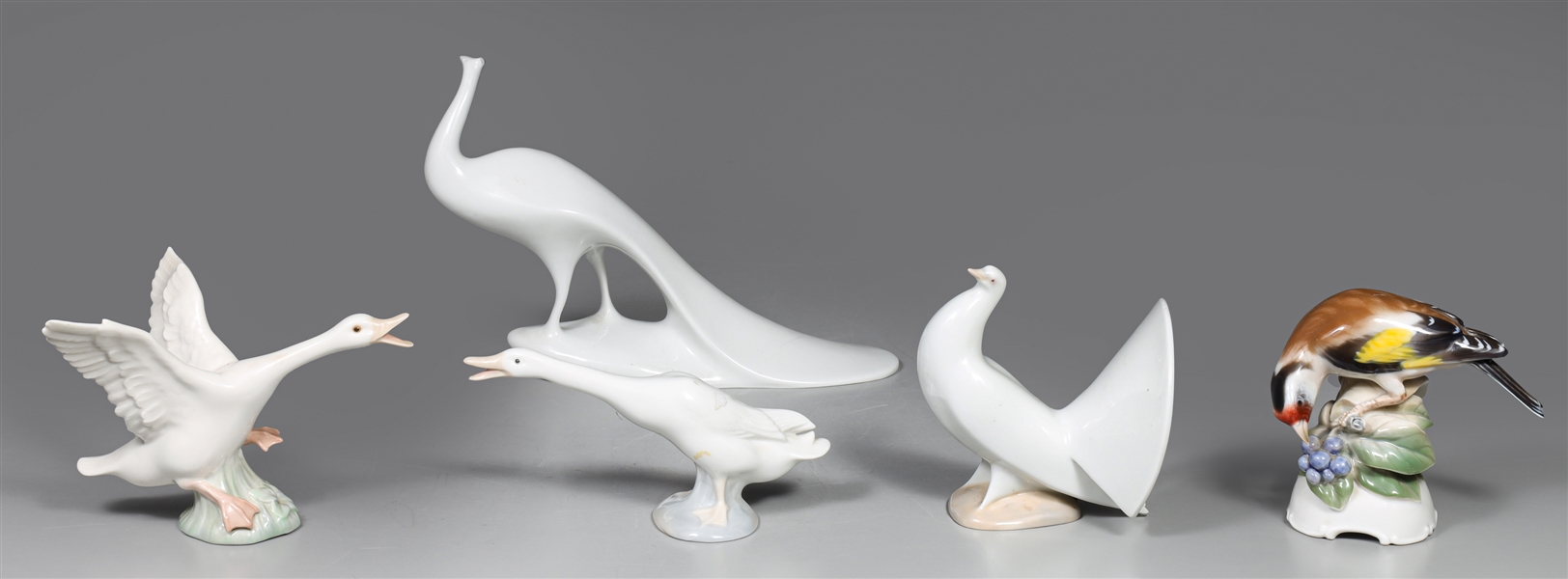 Group of five fine porcelain bird