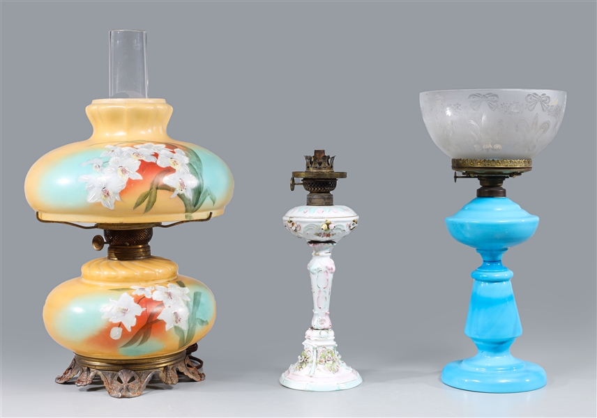 Group of three antique porcelain lamps,