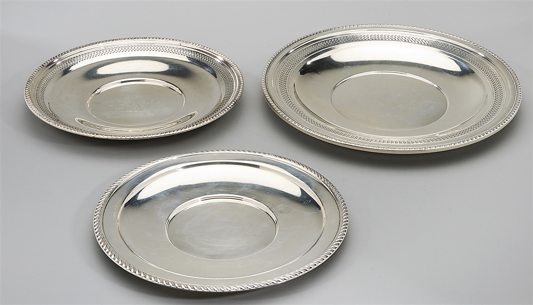 Three marked sterling silver platters;