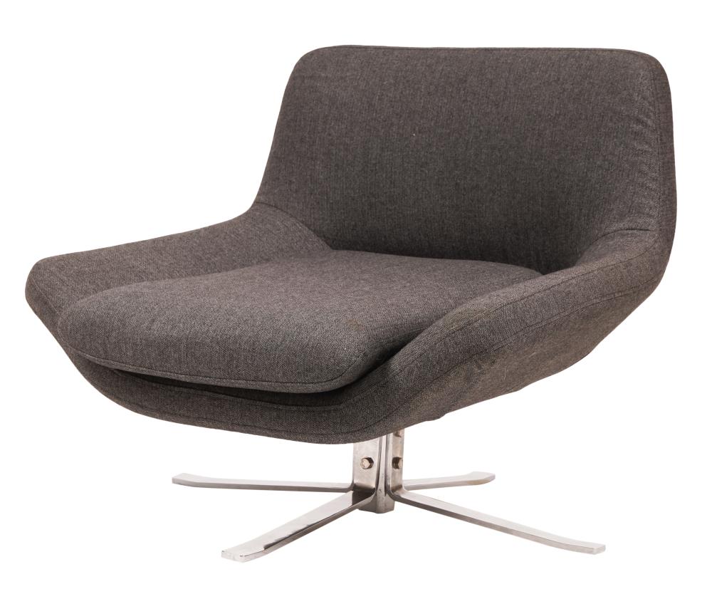 MODERNIST SWIVEL ARMCHAIRModernist