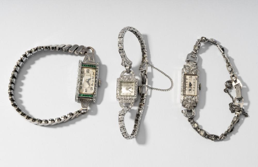 THREE ART DECO STYLE DIAMOND WATCHESThree