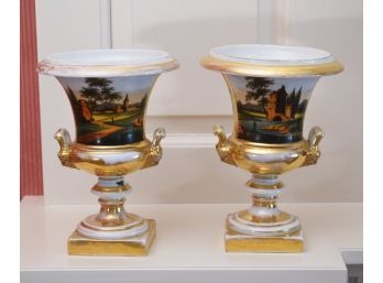 A pair of antique gilt and scenic