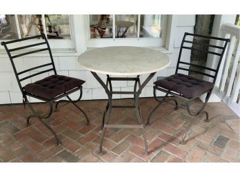 A contemporary iron bistro set,