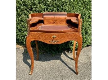 A Louis XV style ladies desk with a