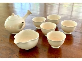 A vintage ceramic tea set, ivory with