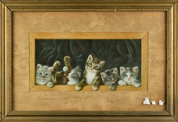 A vintage colored print of kittens,