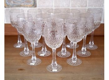 A set of twelve fine etched crystal