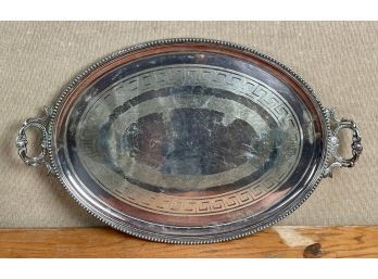 A large silver plated tray with