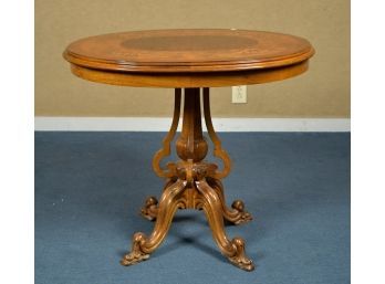 A 20th C. center table with an