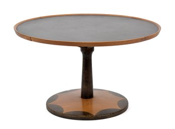 A vintage round coffee table, with