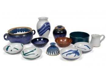 Twelve pieces of of studio pottery,