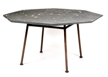 A vintage patio table with an octagonal 305db7
