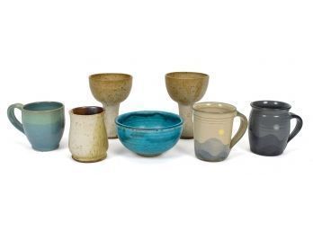 Seven pieces of art pottery, including: