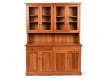 A Lyndon Furniture cherry two-part hutch