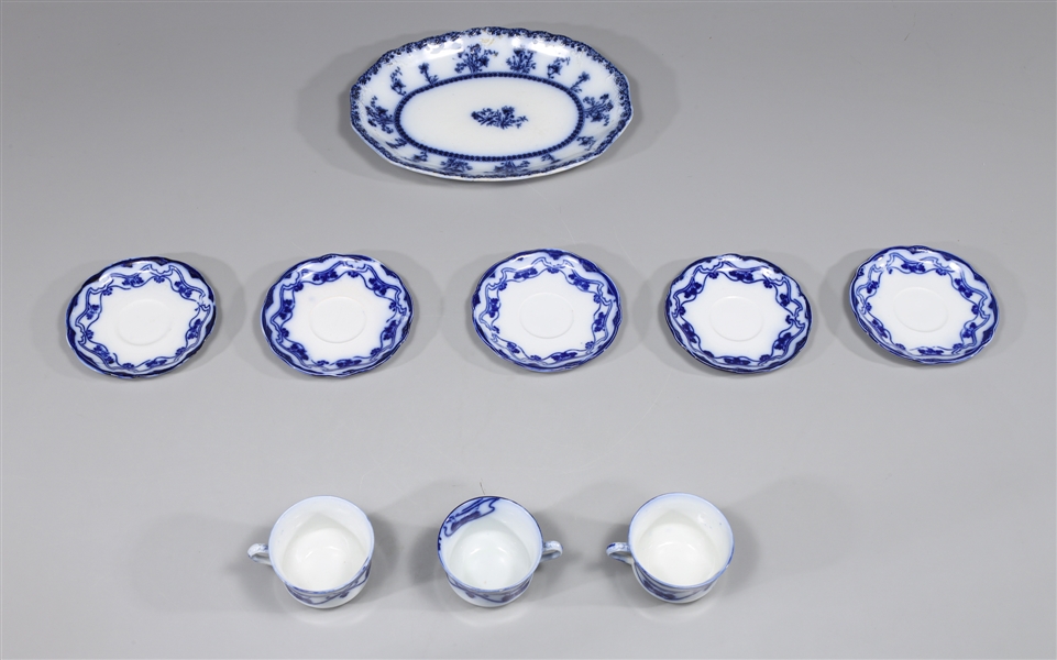 Group of nine antique flow blue