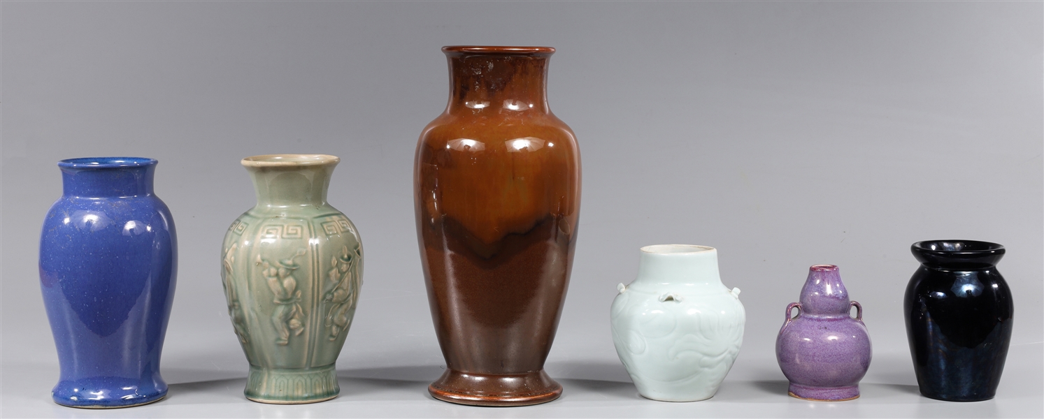 Group of six Asian pottery vase