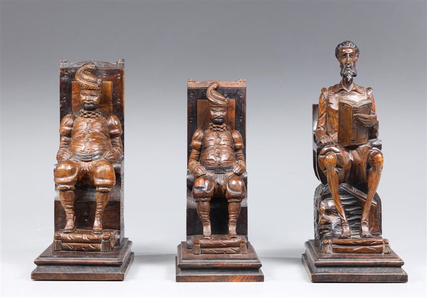 Group of three carved wood Don 303c04