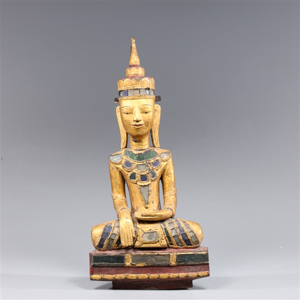 Antique southeast Asian seated