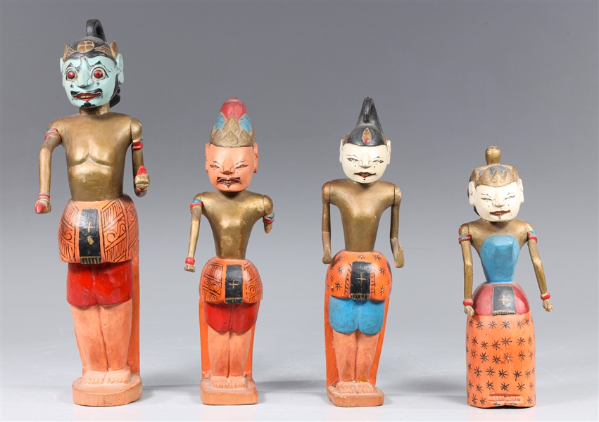 Group of four carved and hand painted 303c69