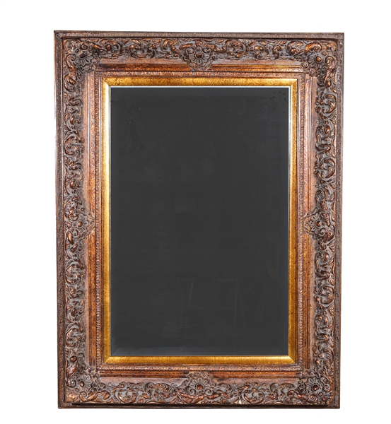 Vintage beveled mirror with intricate 303da6