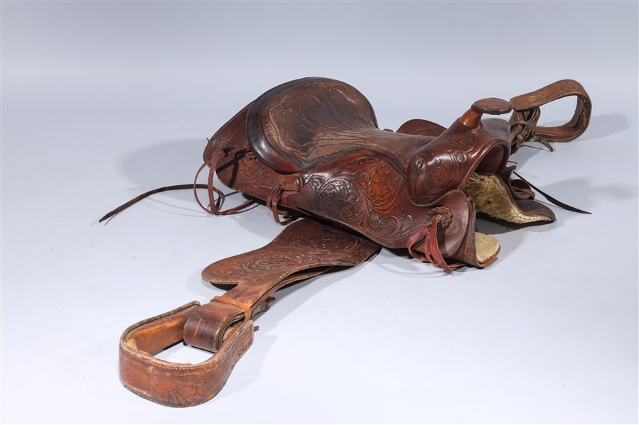 Vintage leather horse saddle with elaborate