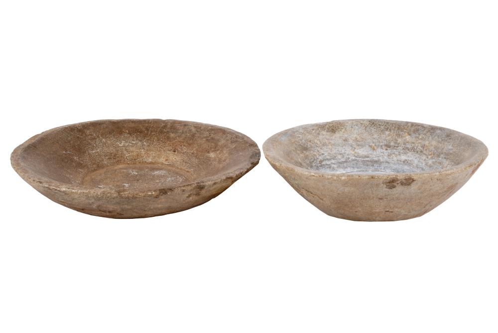 TWO PRIMITIVE CARVED STONE BOWLSTwo