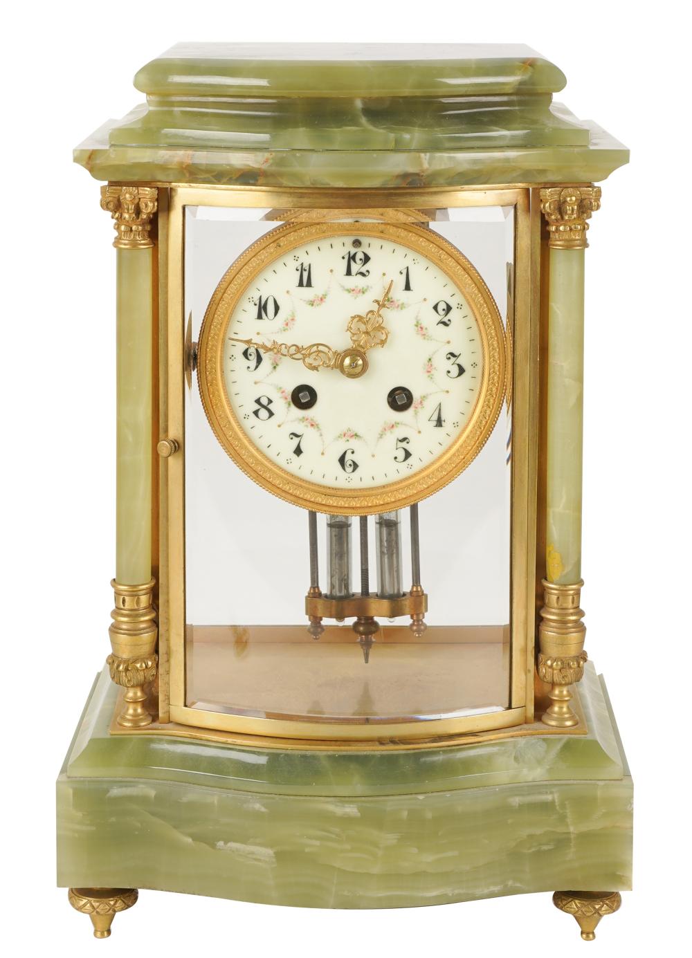 FRENCH ONYX AND GILT METAL MANTEL CLOCKFrench