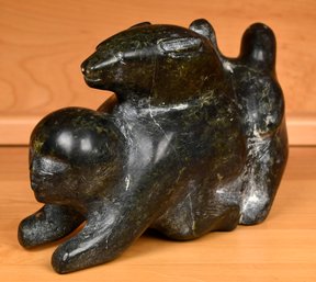 A vintage Inuit stone carving depicting 307166