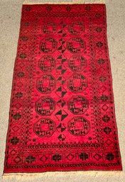 A vintage Bokara scatter rug with