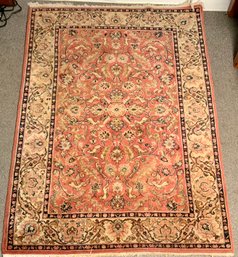 A vintage Oriental rug with floral,