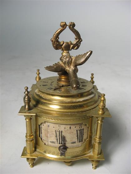 Brass "Phalic" table clock    19th/20th