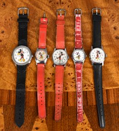 Four Mickey Mouse Disney watches,