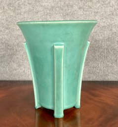 Green glazed art pottery vase with
