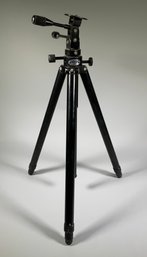 A Tiltall professional aluminum tripod