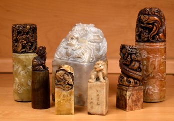 Seven vintage Asian carved stone
