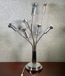 A modern chrome table lamp with