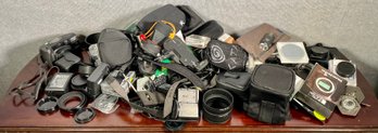 An assembled lot of camera accessories,