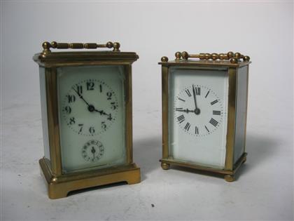 Two brass and glass carriage clocks 4d850